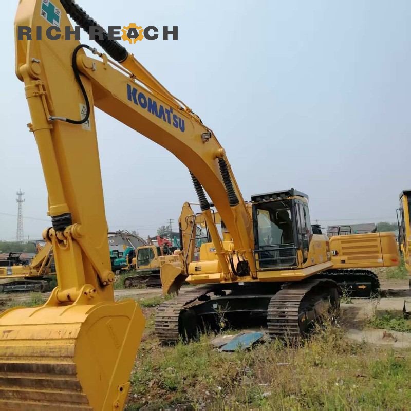 Engine compartment of a 2018 Komatsu PC210 excavator priced at $30,556